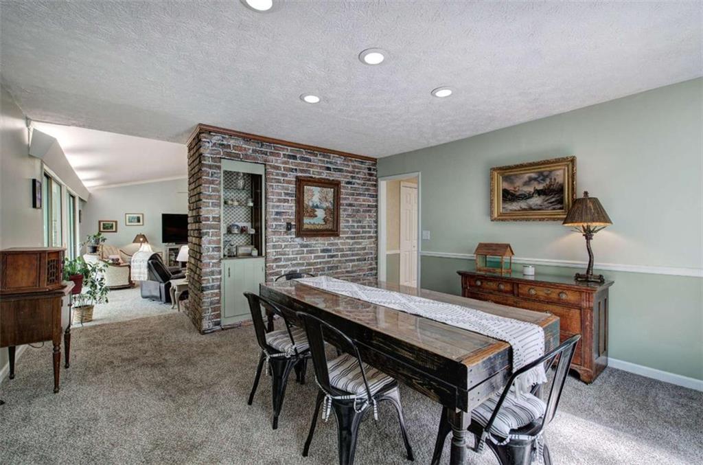 567 Fred Kelly Road Northeast Rome, GA 30161 - Photo 19 of 59 a view of a livingroom with furniture and window