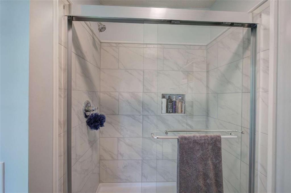 567 Fred Kelly Road Northeast Rome, GA 30161 - Photo 27 of 59 a bathroom with a shower and a sink