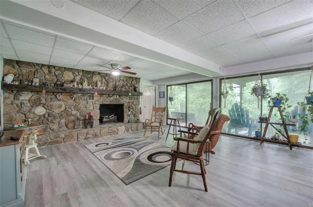 a view of a two chairs in the balcony