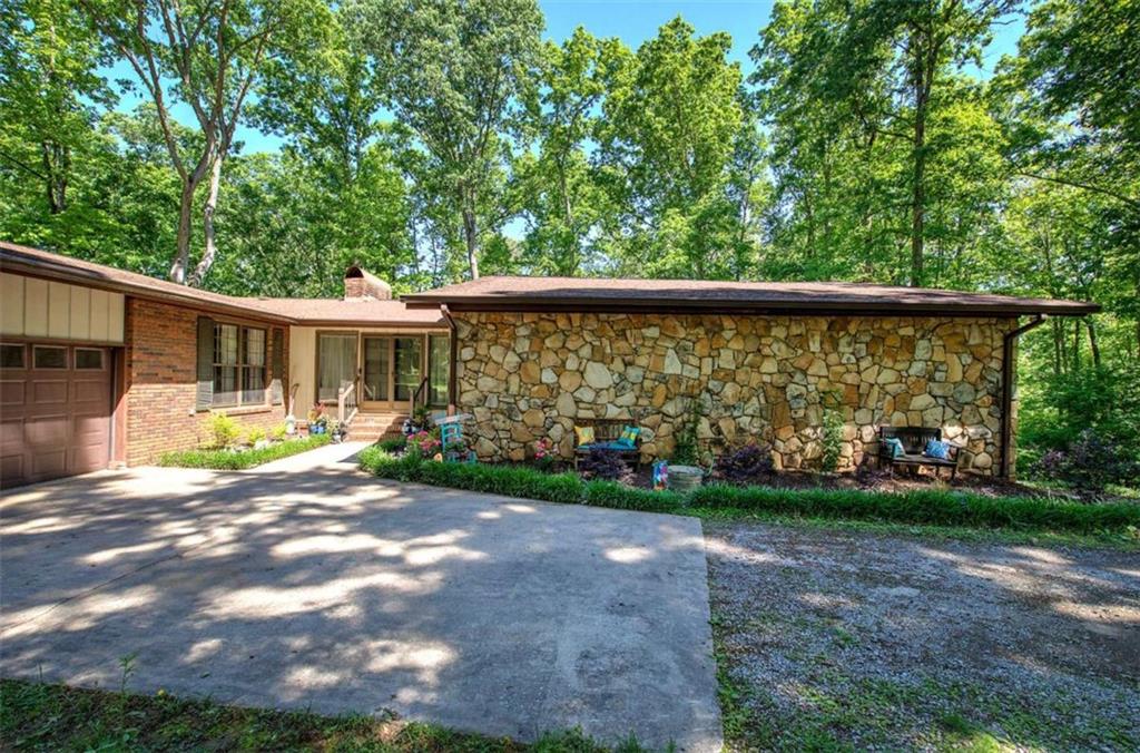 567 Fred Kelly Road Northeast Rome, GA 30161 - Photo 10 of 59 a view of a house with backyard and sitting area