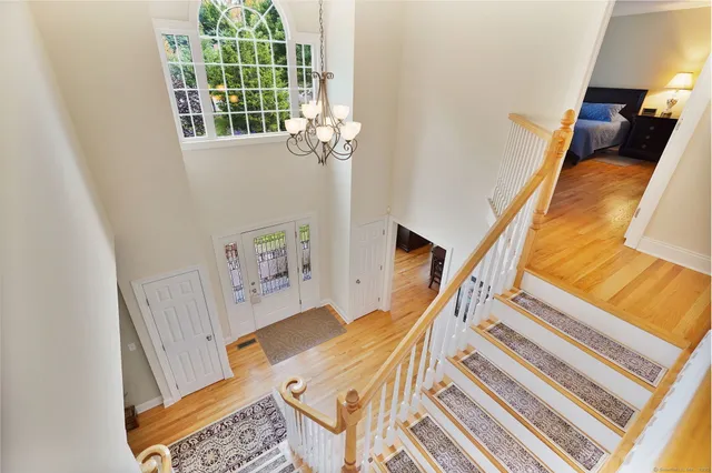a view of stairs and with furniture