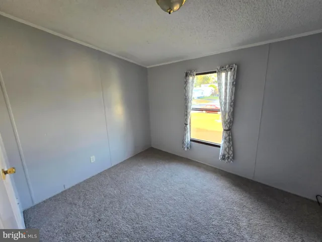 a view of empty room with window