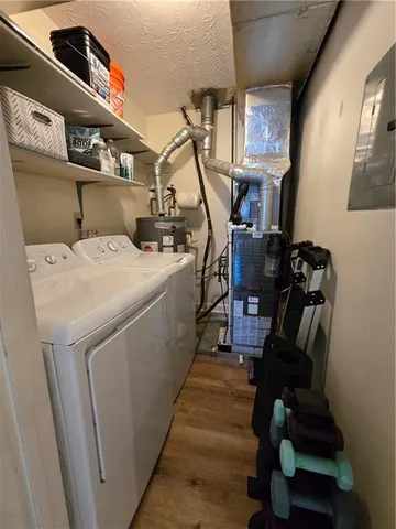 a utility room with dryer and washer