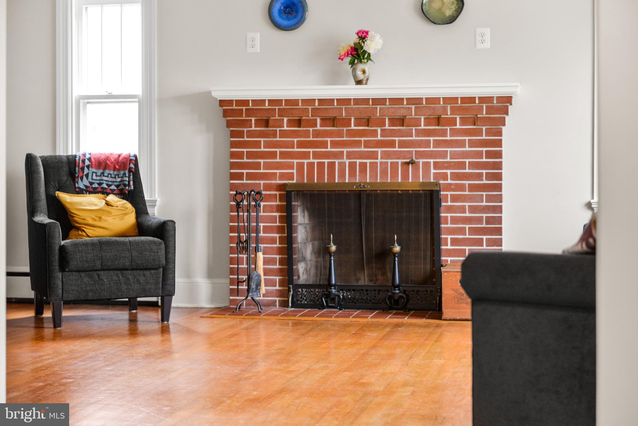 616 West Patrick Street Frederick, MD 21701 - Photo 11 of 81 gather 'round the fireplace