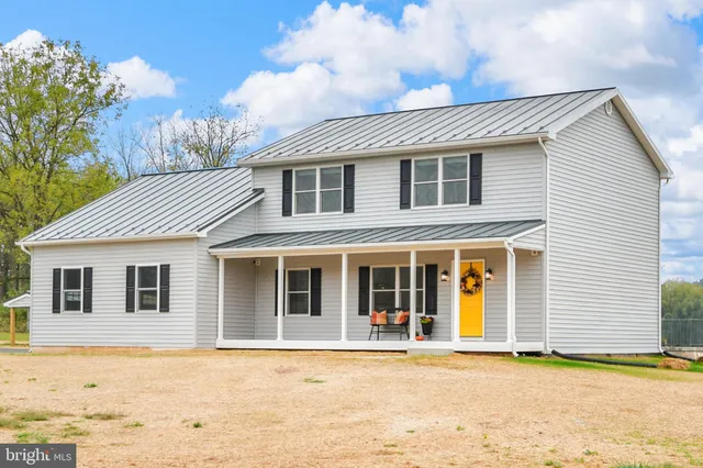 a view of a swimming pool with a lounge chairs