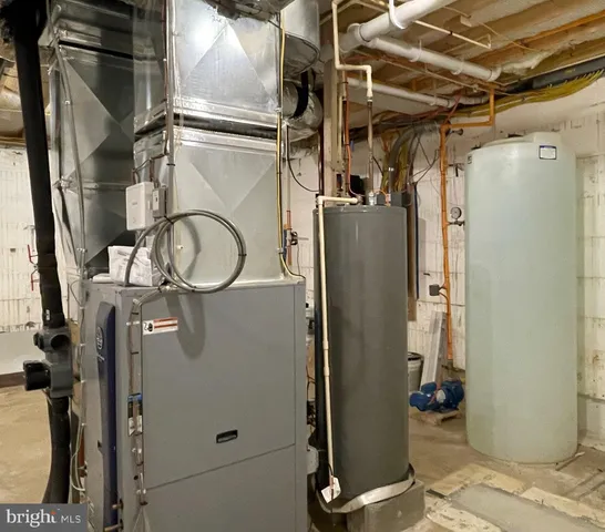 a view of a refrigerator with utility room