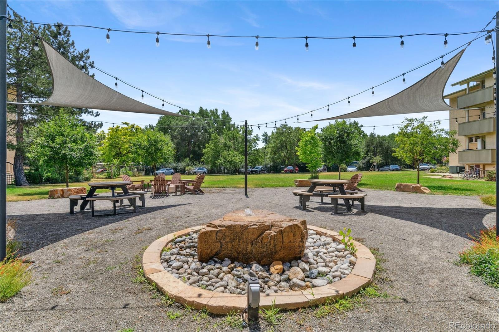 3035 Oneal Parkway, Unit 37V Boulder, CO 80301 - Photo 38 of 49 a view of a swimming pool with a patio