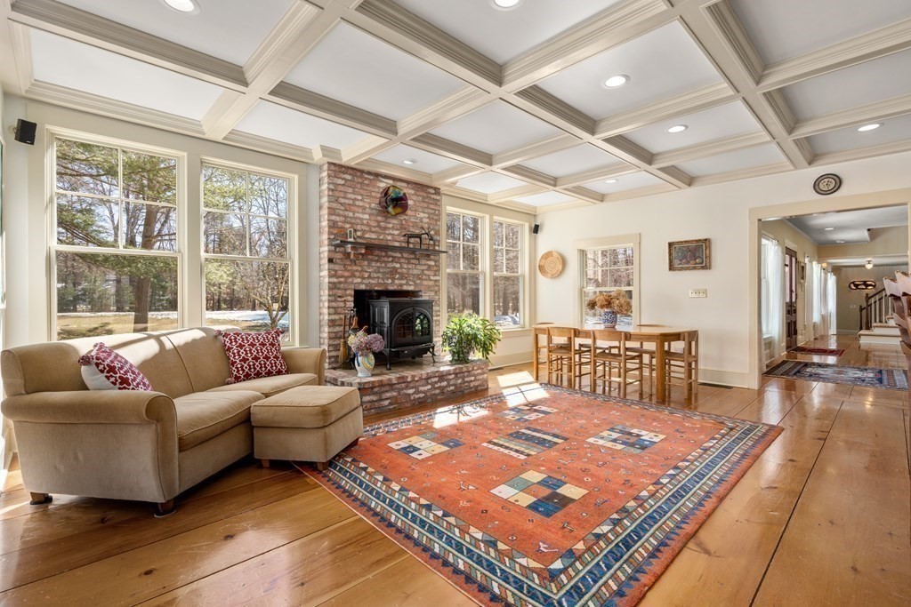 9 Lantern Lane Natick, MA 01760 - Photo 13 of 42 a living room with furniture pool table and a fireplace