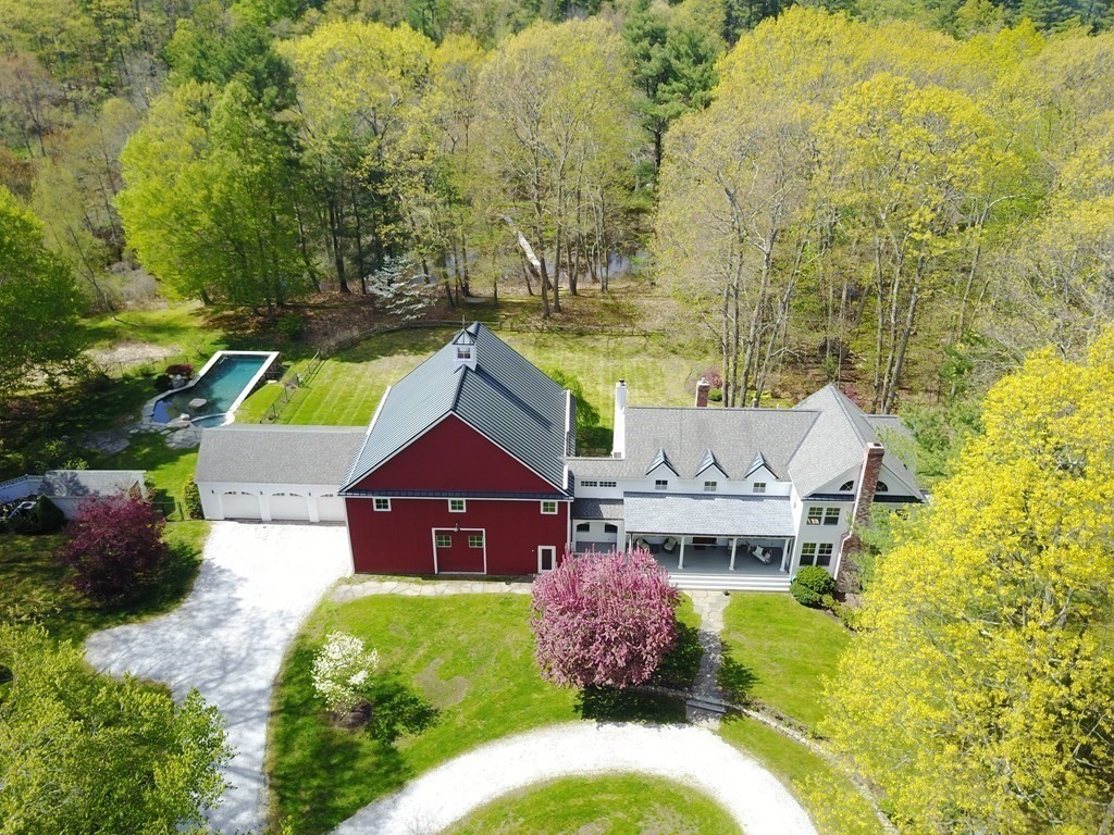 9 Lantern Lane Natick, MA 01760 - Photo 3 of 42 a aerial view of a house with a garden