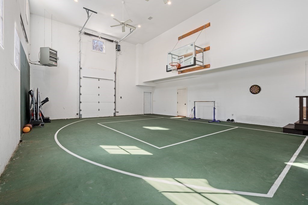 9 Lantern Lane Natick, MA 01760 - Photo 34 of 42 a view of a room with gym equipment