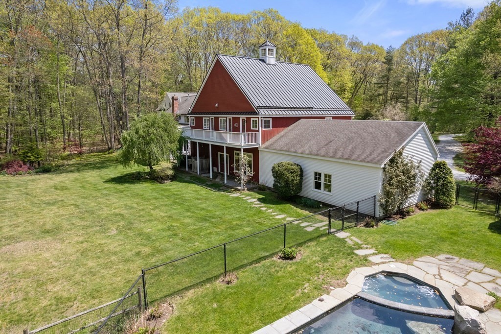 9 Lantern Lane Natick, MA 01760 - Photo 35 of 42 a aerial view of a house next to a big yard and large trees