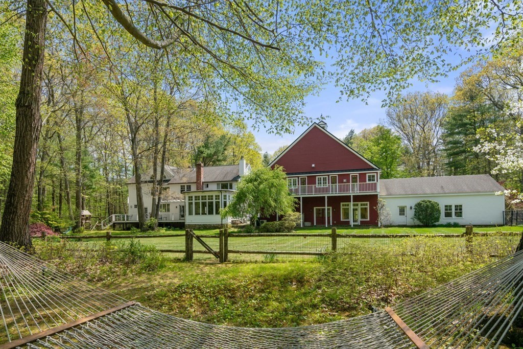 9 Lantern Lane Natick, MA 01760 - Photo 38 of 42 front view of a house with a yard