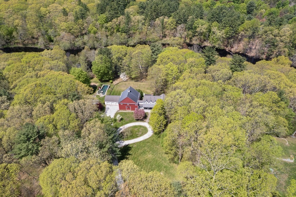 9 Lantern Lane Natick, MA 01760 - Photo 41 of 42 a bathroom with a sink and a mirror