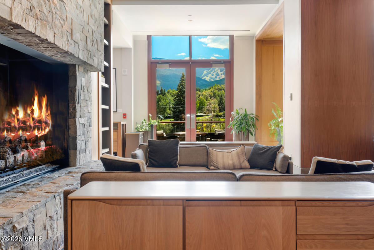 a view of living room with furniture and flat screen tv