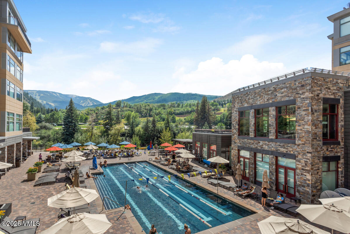 126 Riverfront Lane, Unit 912 Avon, CO 81620 - Photo 3 of 28 a view of a terrace with furniture and a terrace view