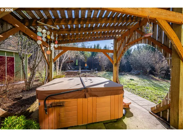 a view of yard with patio