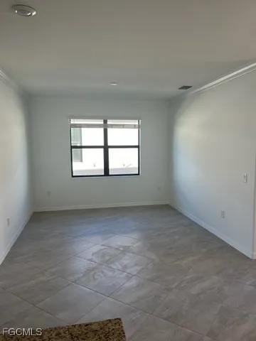 an empty room with a window