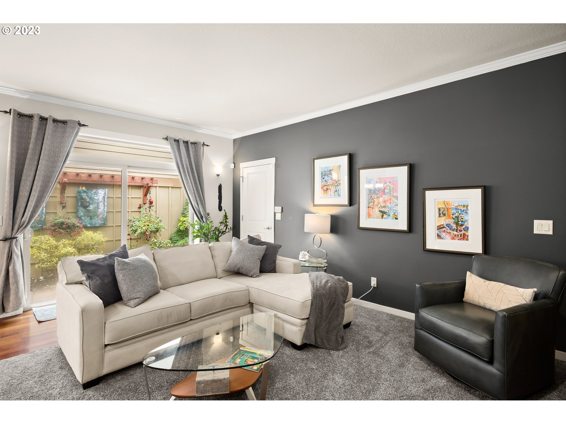 8964 Southwest Taylors Ferry Road Portland, OR 97223 - Photo 13 of 32 a living room with furniture and a large window
