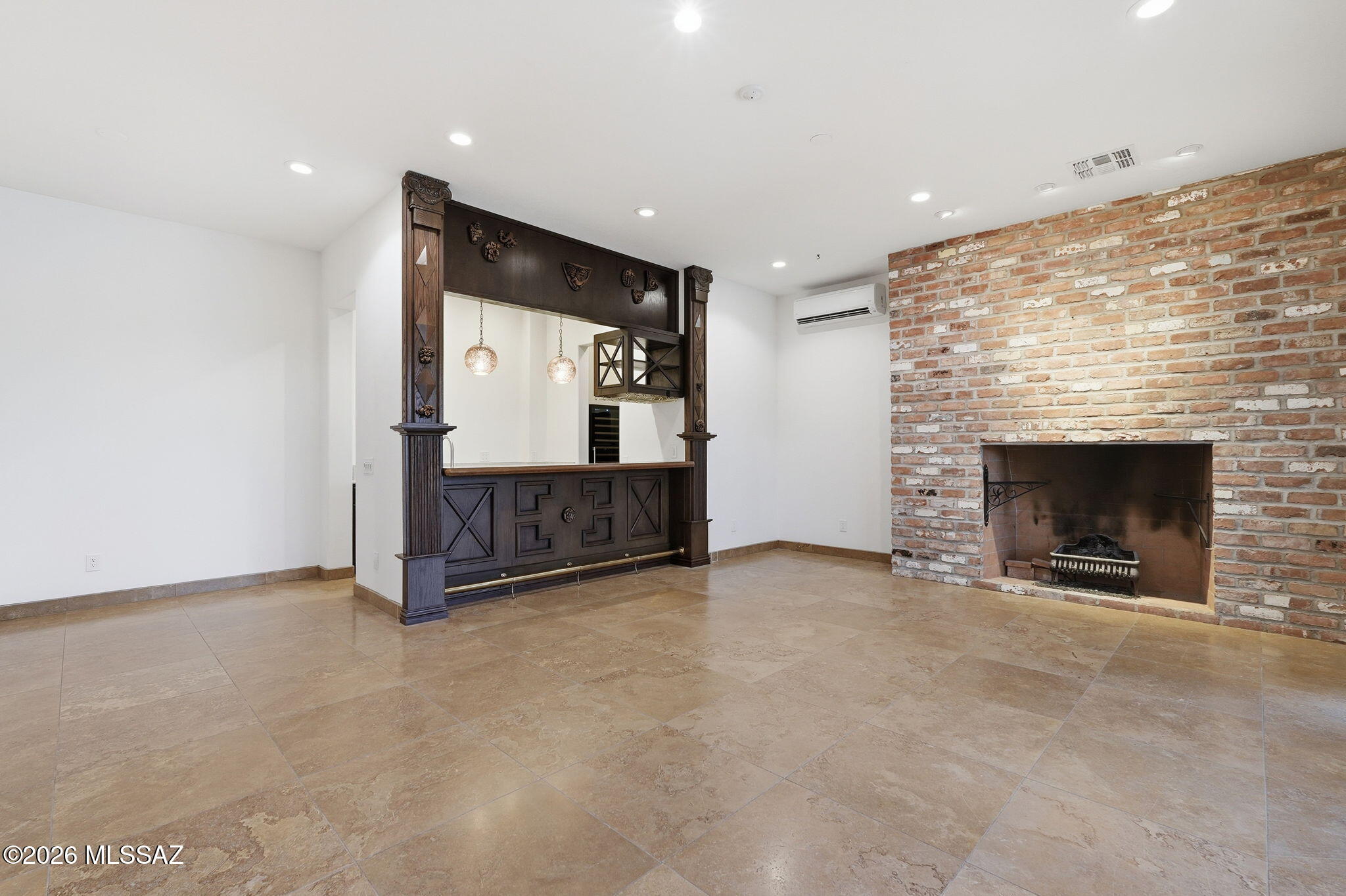 38200 South Stone Ridge Court Tucson, AZ 85739 - Photo 32 of 51 Rec Room Fireplace and Bar