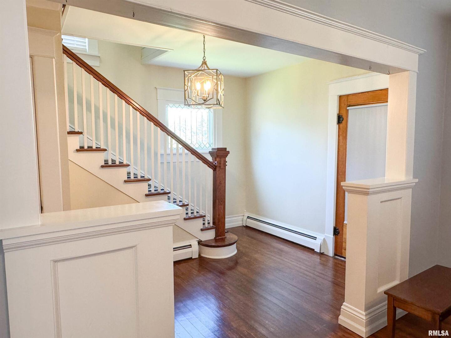 102 Southeast Front Street Dongola, IL 62926 - Photo 11 of 78 a view of entryway and hall with wooden floor