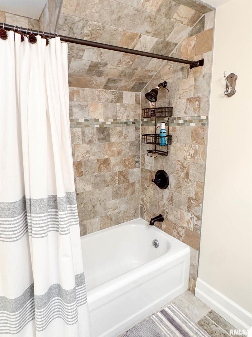 102 Southeast Front Street Dongola, IL 62926 - Photo 45 of 78 a bathroom with a bathtub and a shower