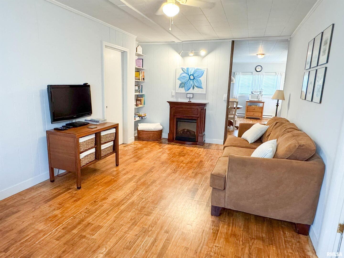 102 Southeast Front Street Dongola, IL 62926 - Photo 60 of 83 a living room with furniture and a flat screen tv