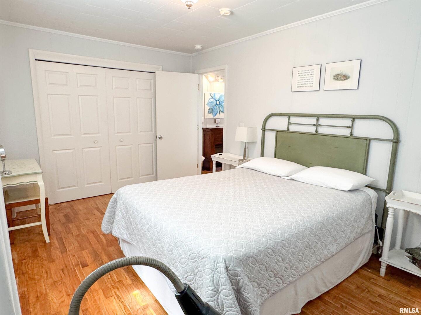 102 Southeast Front Street Dongola, IL 62926 - Photo 71 of 83 a bedroom with a bed and a table