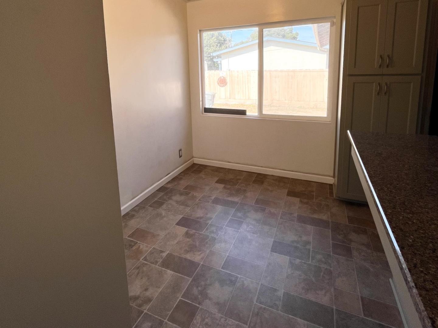 414 Crescent Way Salinas, CA 93906 - Photo 7 of 21 a view of an empty room with a window