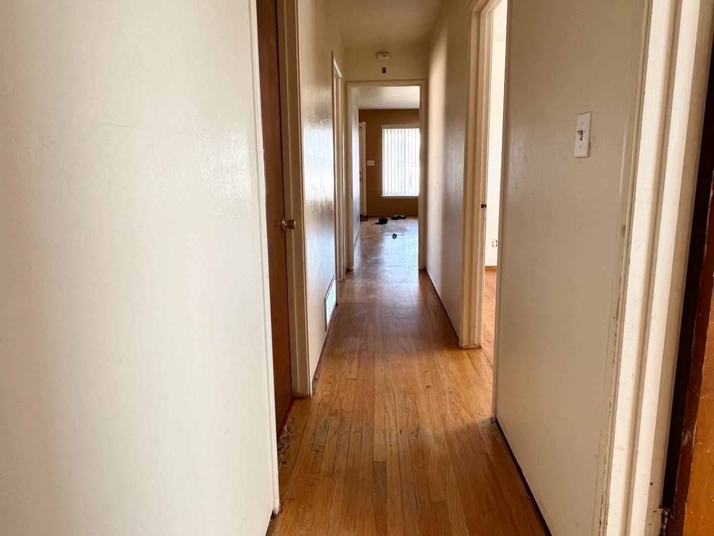 414 Crescent Way Salinas, CA 93906 - Photo 9 of 21 a view of a hallway with wooden floor