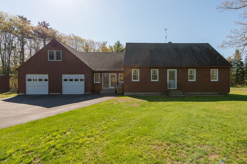 59 Pillsbury Road Ashby, MA 01431 - Photo 1 of 42 a front view of a house with a yard