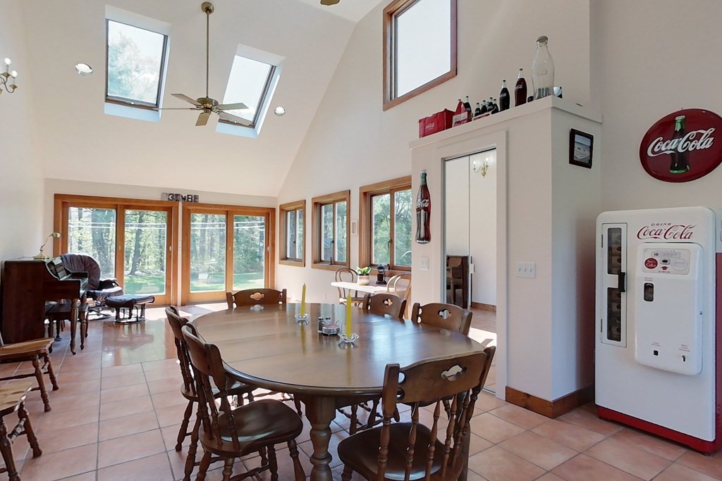 59 Pillsbury Road Ashby, MA 01431 - Photo 14 of 42 a view of a dining room with furniture and chandelier