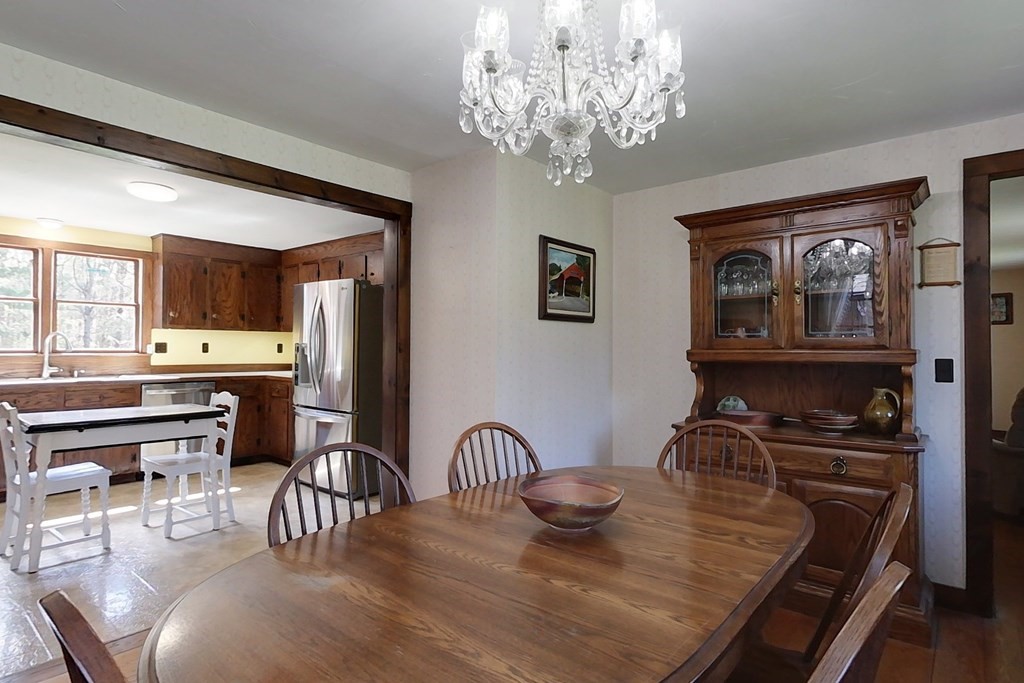 59 Pillsbury Road Ashby, MA 01431 - Photo 7 of 42 a kitchen with a table and chairs