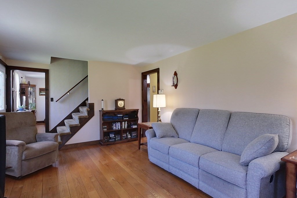59 Pillsbury Road Ashby, MA 01431 - Photo 8 of 42 a living room with furniture and wooden floor