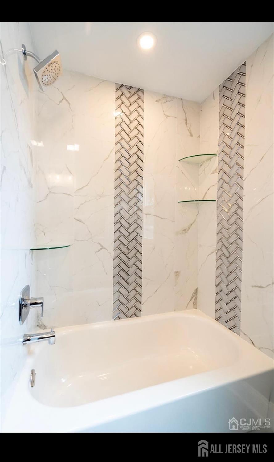 14 Byron Road North Brunswick, NJ 08902 - Photo 13 of 27 a bathroom with a bathtub and shower