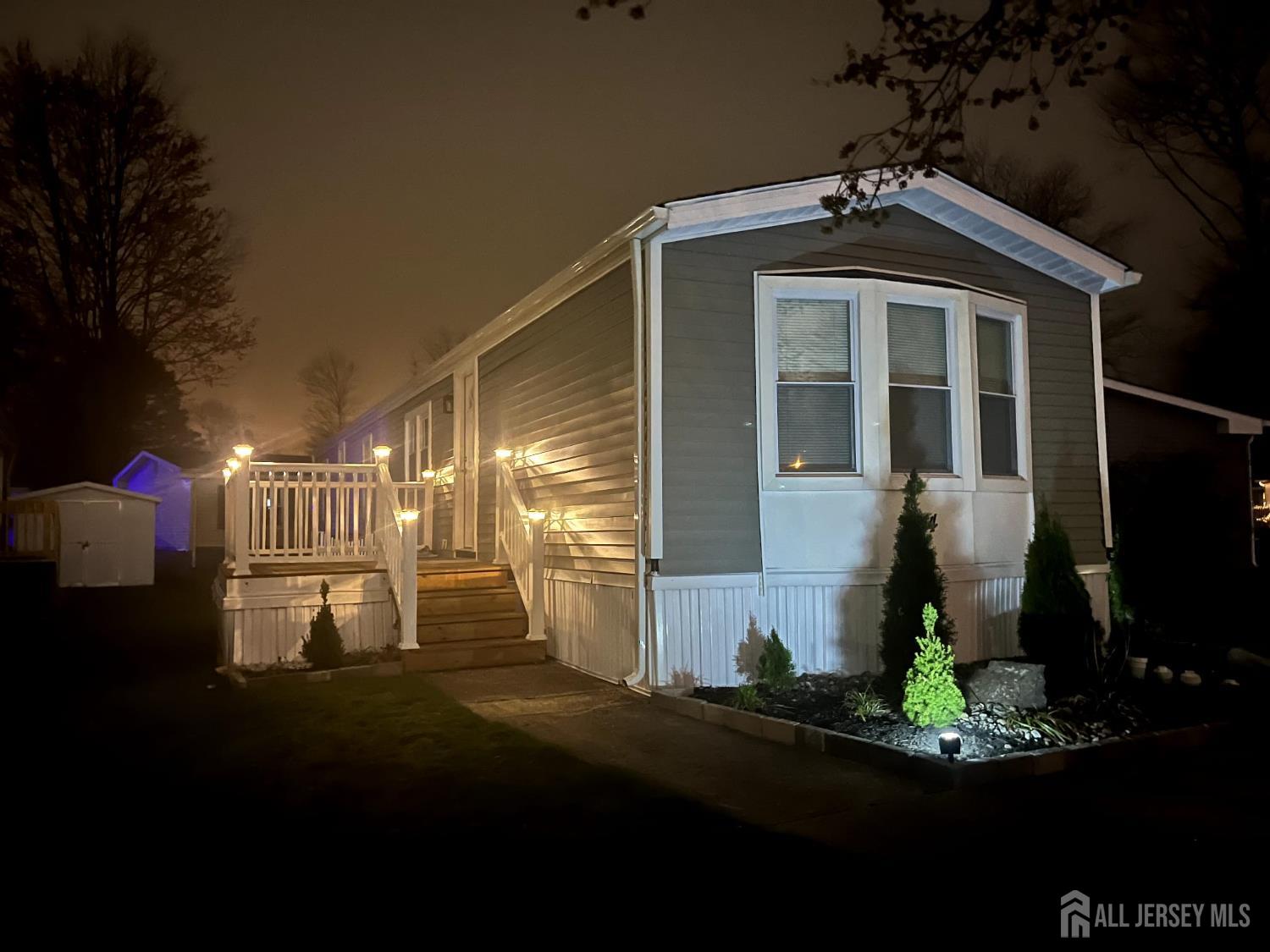 14 Byron Road North Brunswick, NJ 08902 - Photo 23 of 27 a front view of a house with a yard