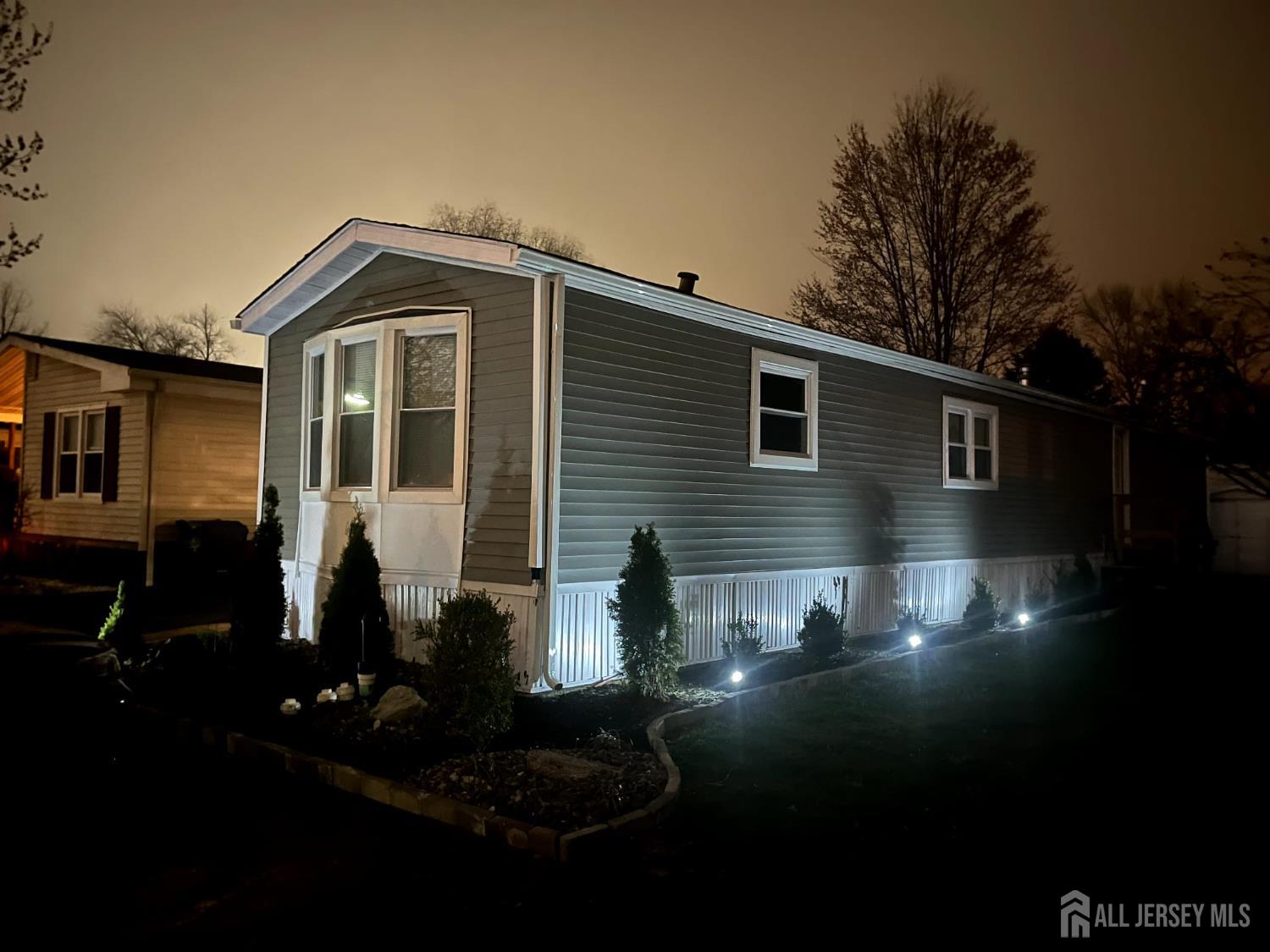 14 Byron Road North Brunswick, NJ 08902 - Photo 24 of 27 a front view of a house with yard