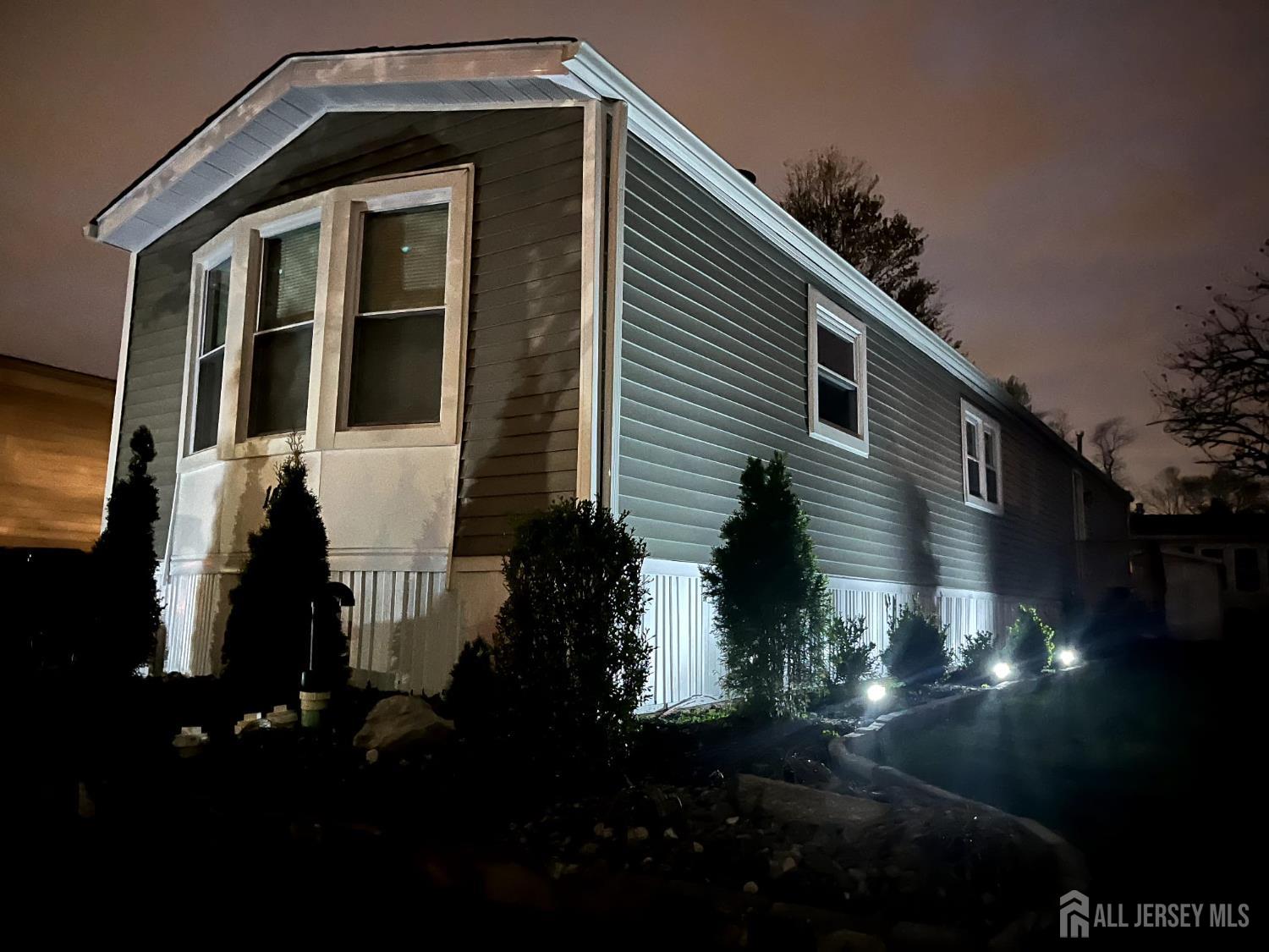 14 Byron Road North Brunswick, NJ 08902 - Photo 25 of 27 a front view of a house with a yard
