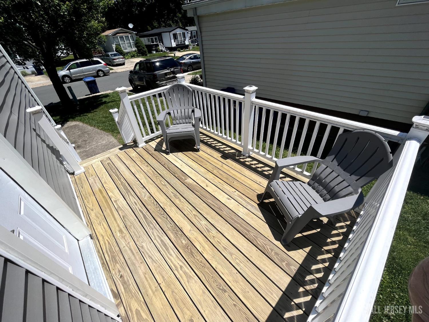 14 Byron Road North Brunswick, NJ 08902 - Photo 4 of 27 a view of balcony with wooden floor