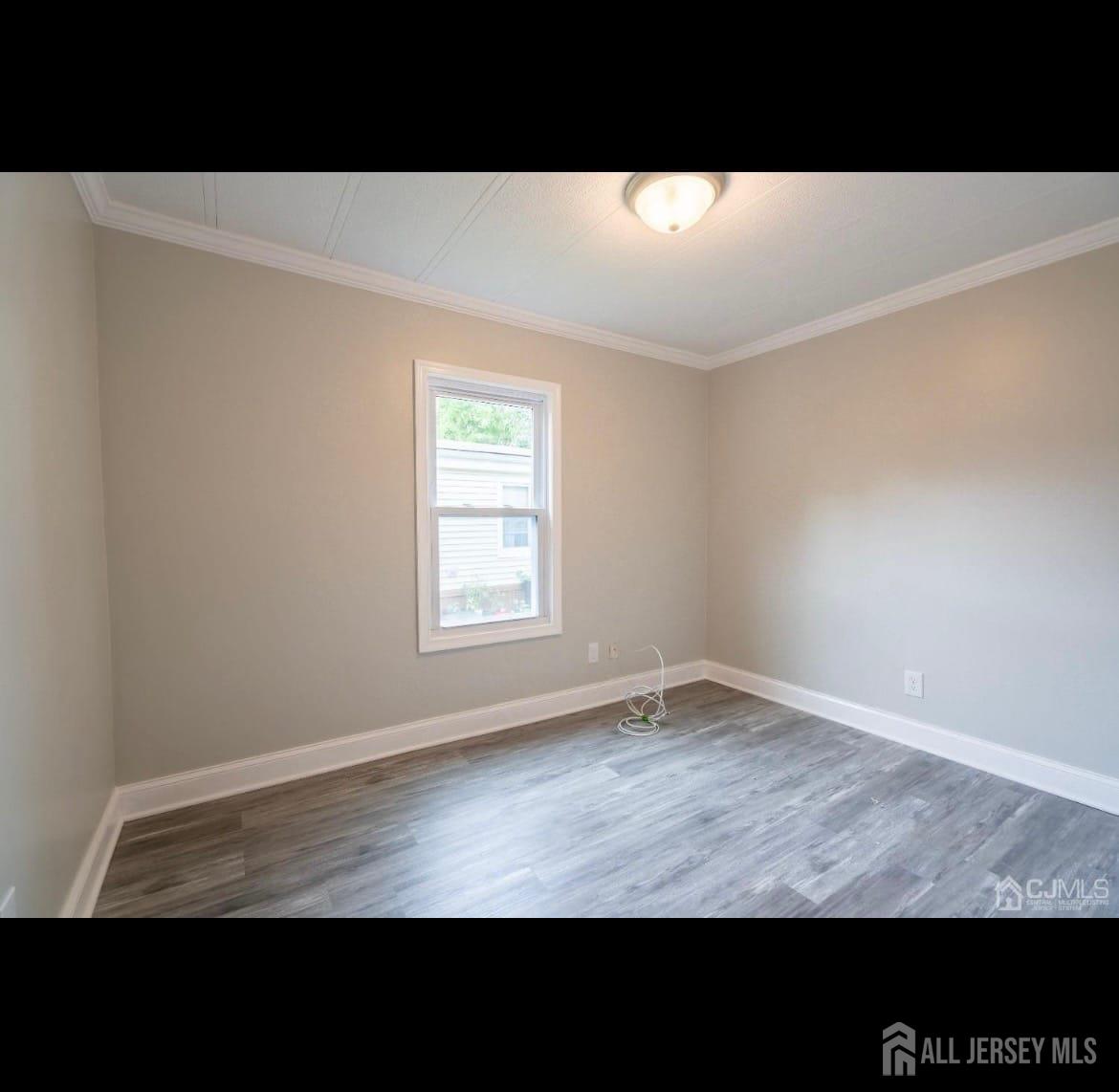 14 Byron Road North Brunswick, NJ 08902 - Photo 10 of 27 a view of an empty room with a window
