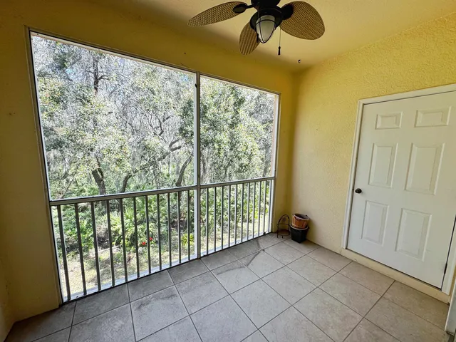 a view of washer and dryer with kitchen in the background