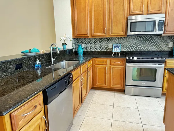 an empty room with windows and entrance