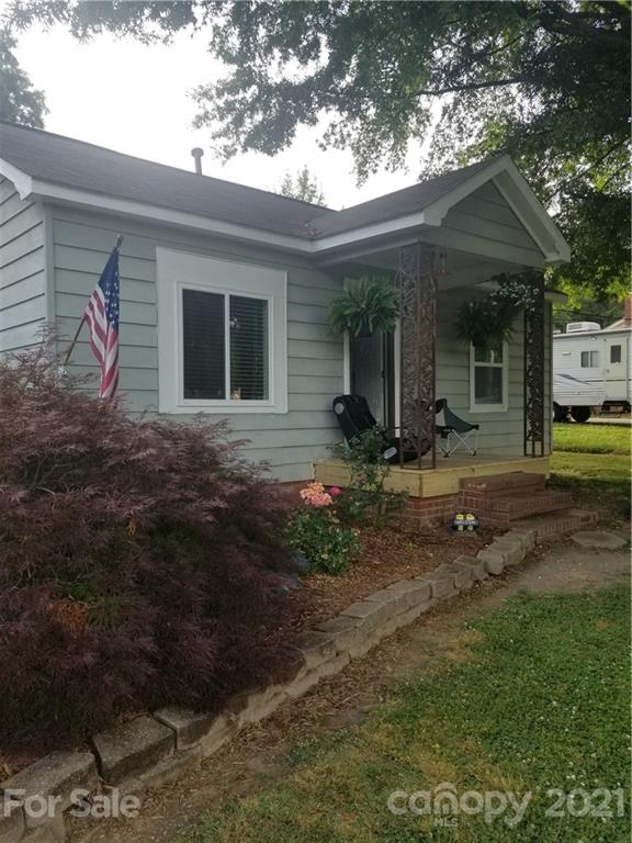 203 North Love Chapel Road Stanfield, NC 28163 - Photo 2 of 19 a front view of a house with garden