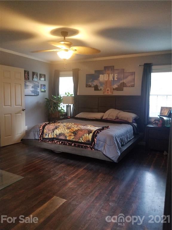 203 North Love Chapel Road Stanfield, NC 28163 - Photo 5 of 19 a bedroom with a bed and window