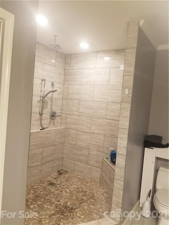 203 North Love Chapel Road Stanfield, NC 28163 - Photo 7 of 19 a bathroom with a shower