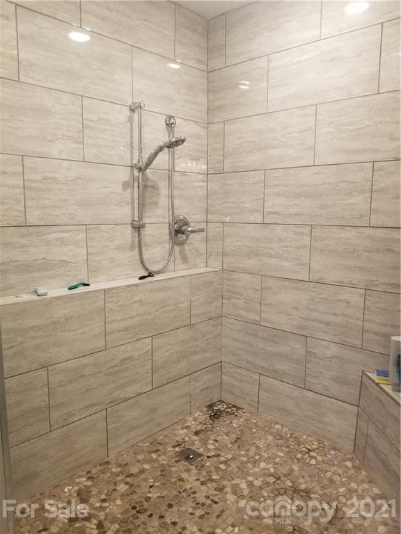 203 North Love Chapel Road Stanfield, NC 28163 - Photo 8 of 19 a bathroom with a shower