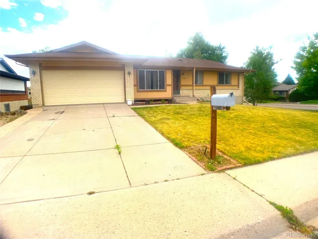 a front view of house with yard