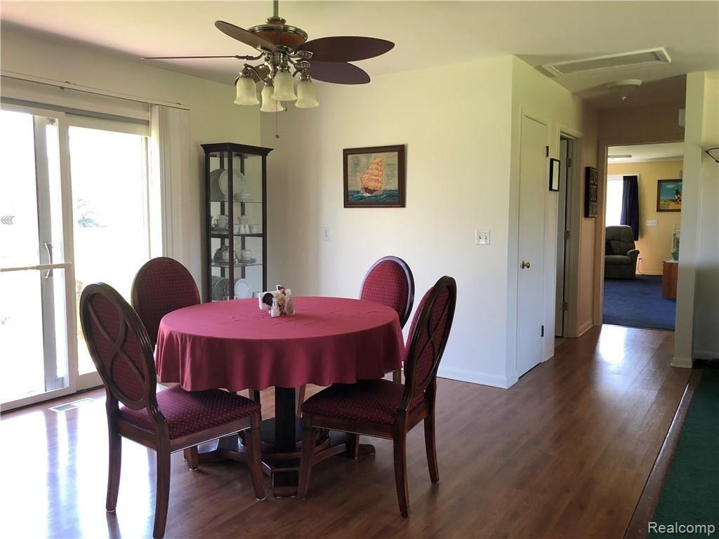 3340 Byron Road Howell, MI 48855 - Photo 10 of 33 Dining space with door wall to deck and hall to family room