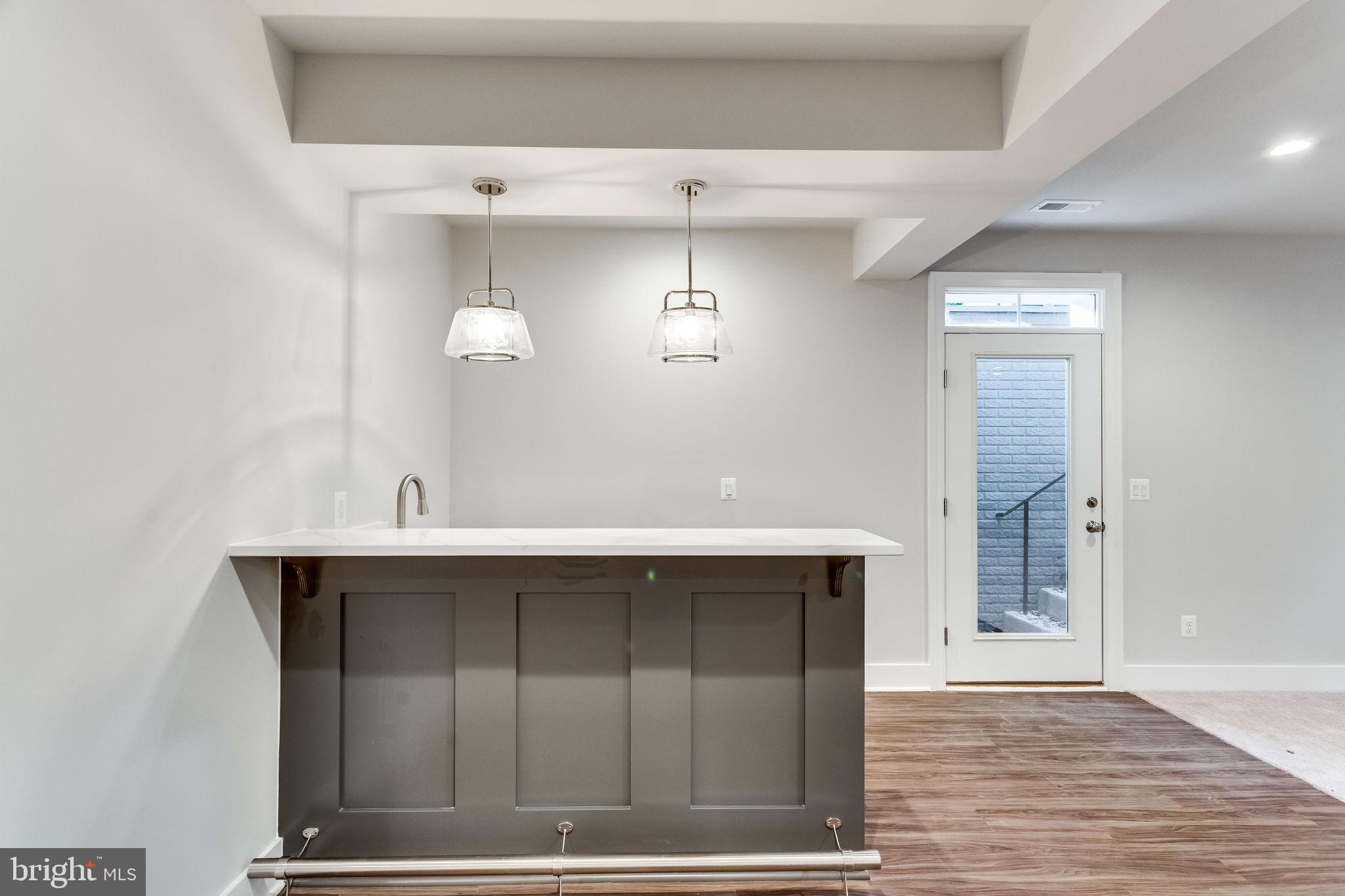 509 Ridge Road Southwest Vienna, VA 22180 - Photo 29 of 34 OPTIONAL WET BAR LOWER LEVEL