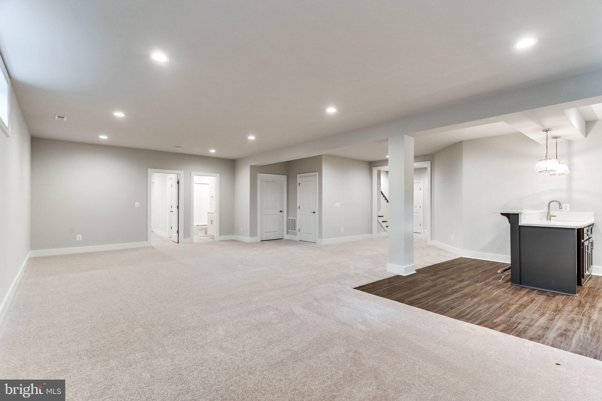 509 Ridge Road Southwest Vienna, VA 22180 - Photo 31 of 34 FINISHED LOWER LEVEL W/ OPTIONAL WET BAR