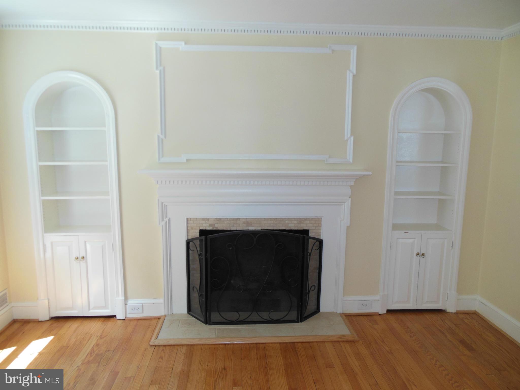 3001 Dunglow Road Baltimore, MD 21222 - Photo 8 of 30 Living Room, fireplace and built ins